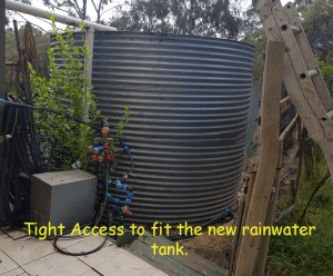 restricted access as indicated by the old rainwater tank with all the plants and garden around it.